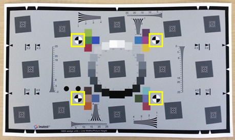 Extended eSFR test chart with four checkered registration markers. Yellow squares are overlaid on the image and encompass the markers.